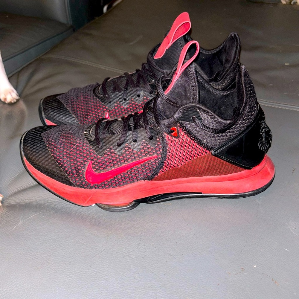 Nike black and red LeBron witness 4 runners.